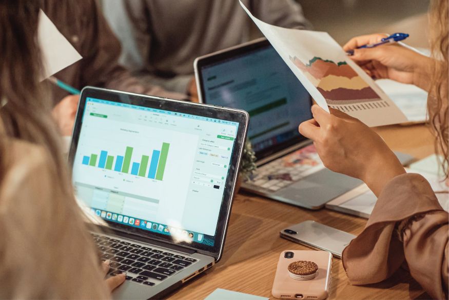 People meeting with laptops