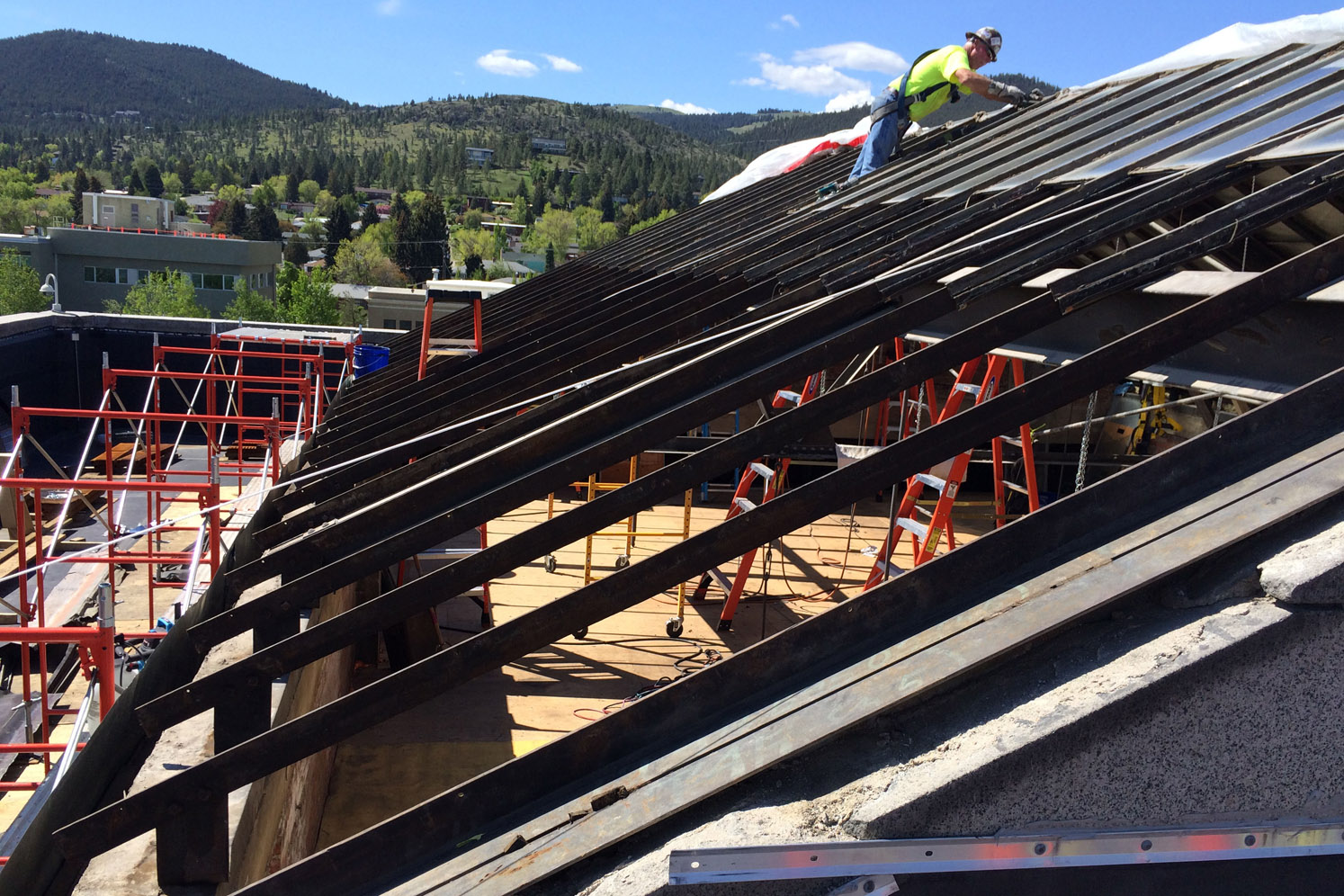 A worker repairing the skylight on the Capitol Building