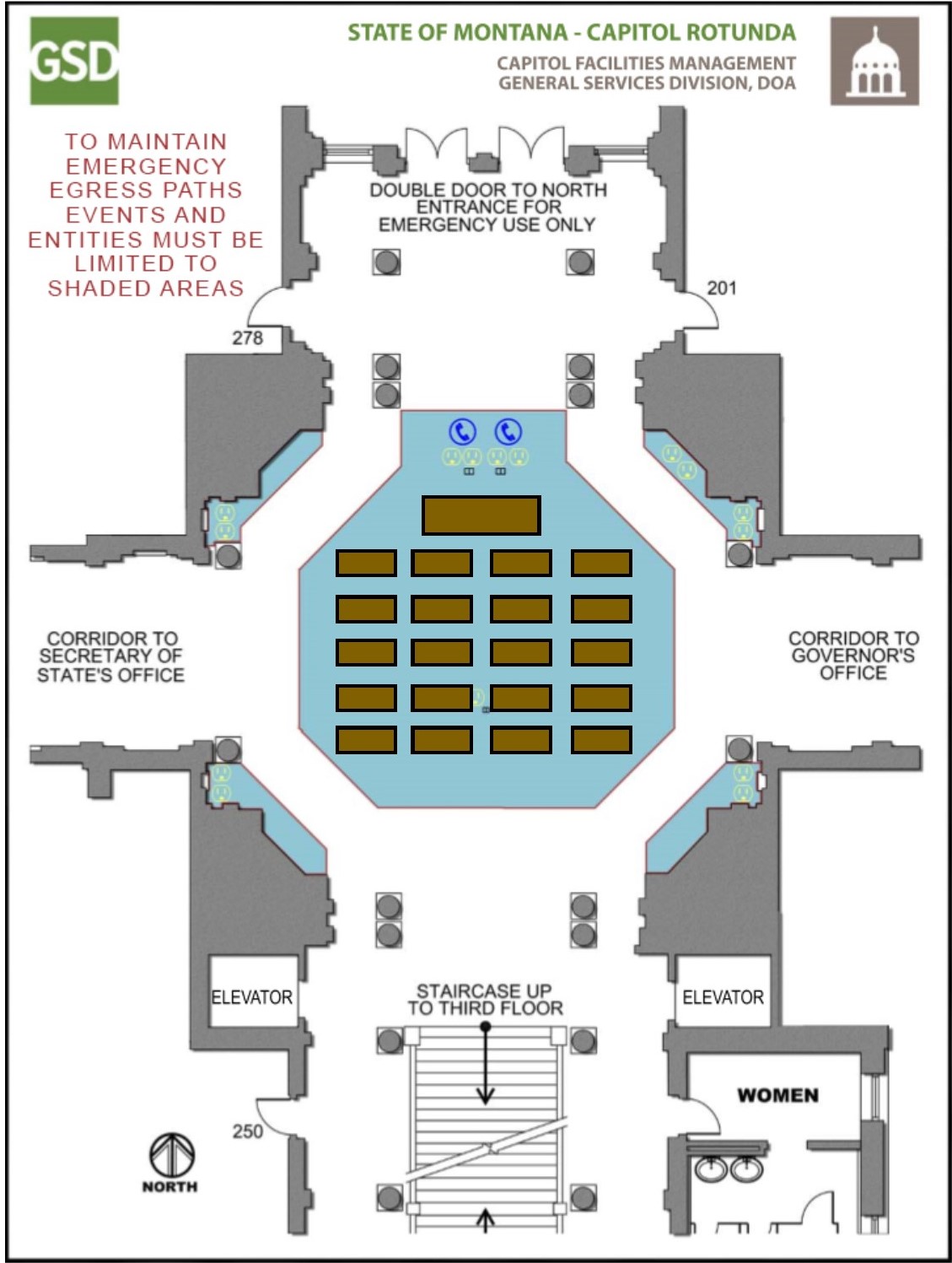 Table at front with smaller tables in rows in the center of the Rotunda